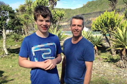 father and son in African countryside
