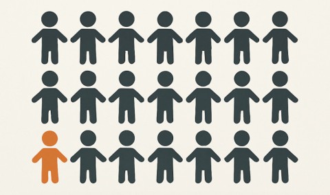 27 grey human figures ... and one orange figure